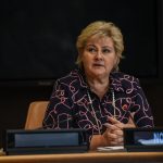 Why has Norway's PM Erna Solberg been accused of 'swallowing camels against the direction of their hair'?