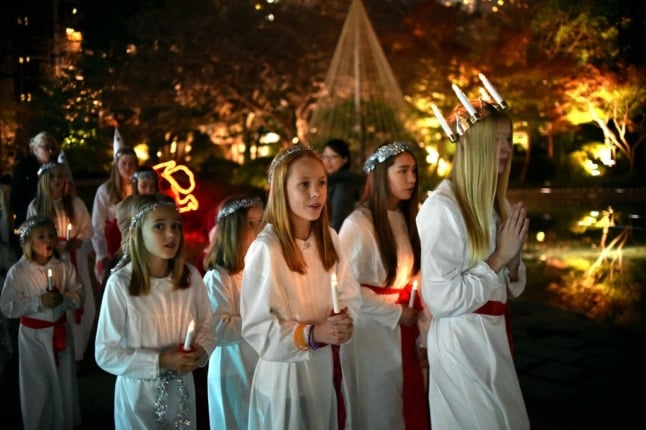 Pictured are children celebrating Santa Lucia. 