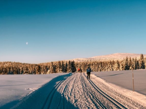 Pictured are people on a cross-country ski trip in Lillehammer. 