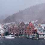 How many people move to Norway for work, and where do they come from?